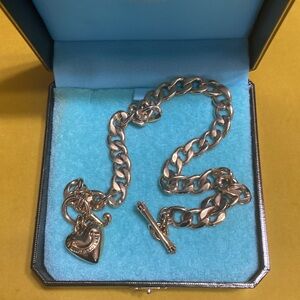 Vintage Juicy Couture charm-holder necklace.